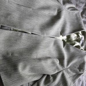 Long sleeved jacket with bright green lining
